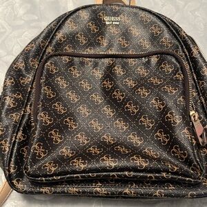 GUESS Black and Tan Patterned Backpack